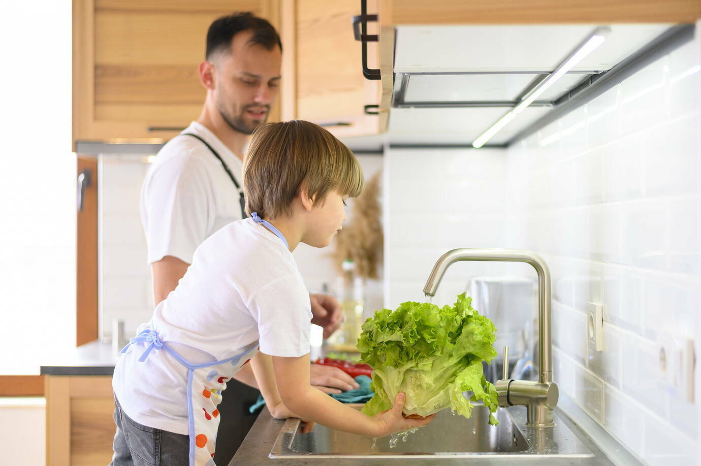 father-son-washing-salad-1380.jpg